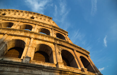 Colosseum in Rome with blue sky at day